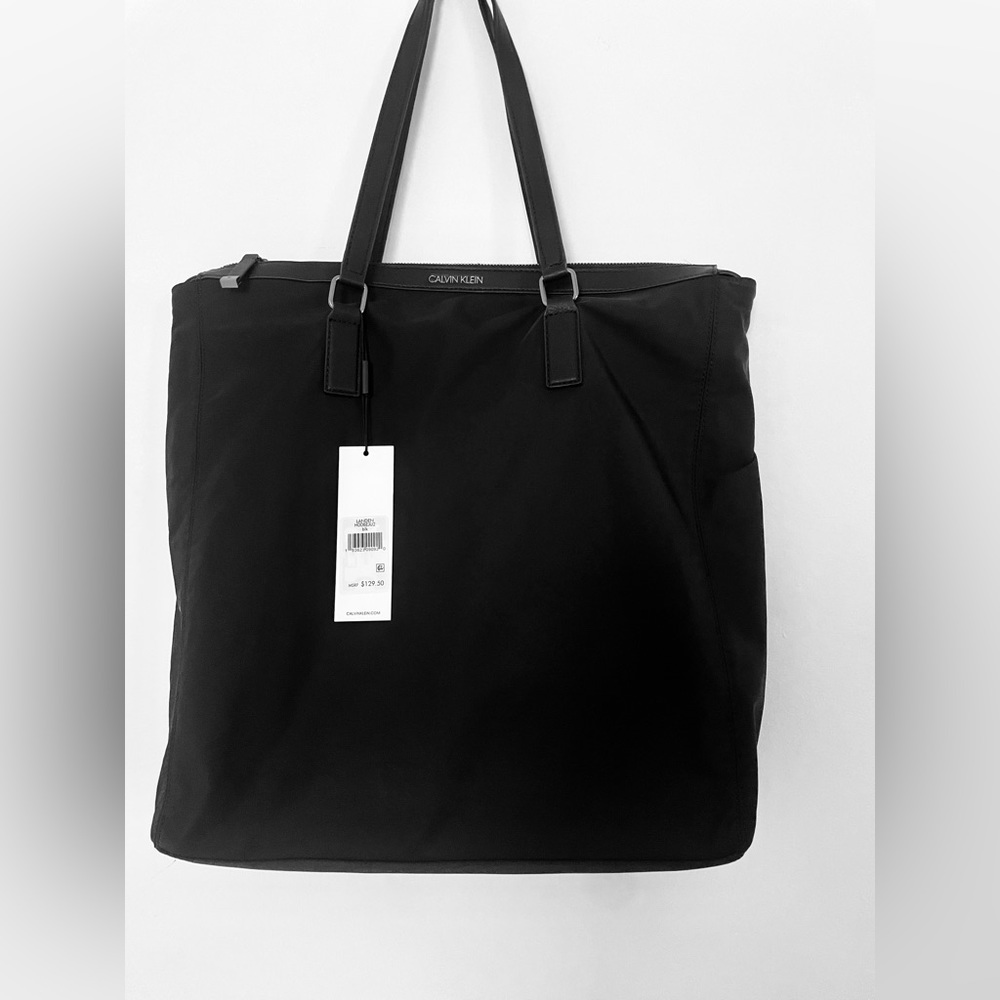 Calvin Klein Landen Hodbeju2 Sleek Tote Bag. Lightweight material.
